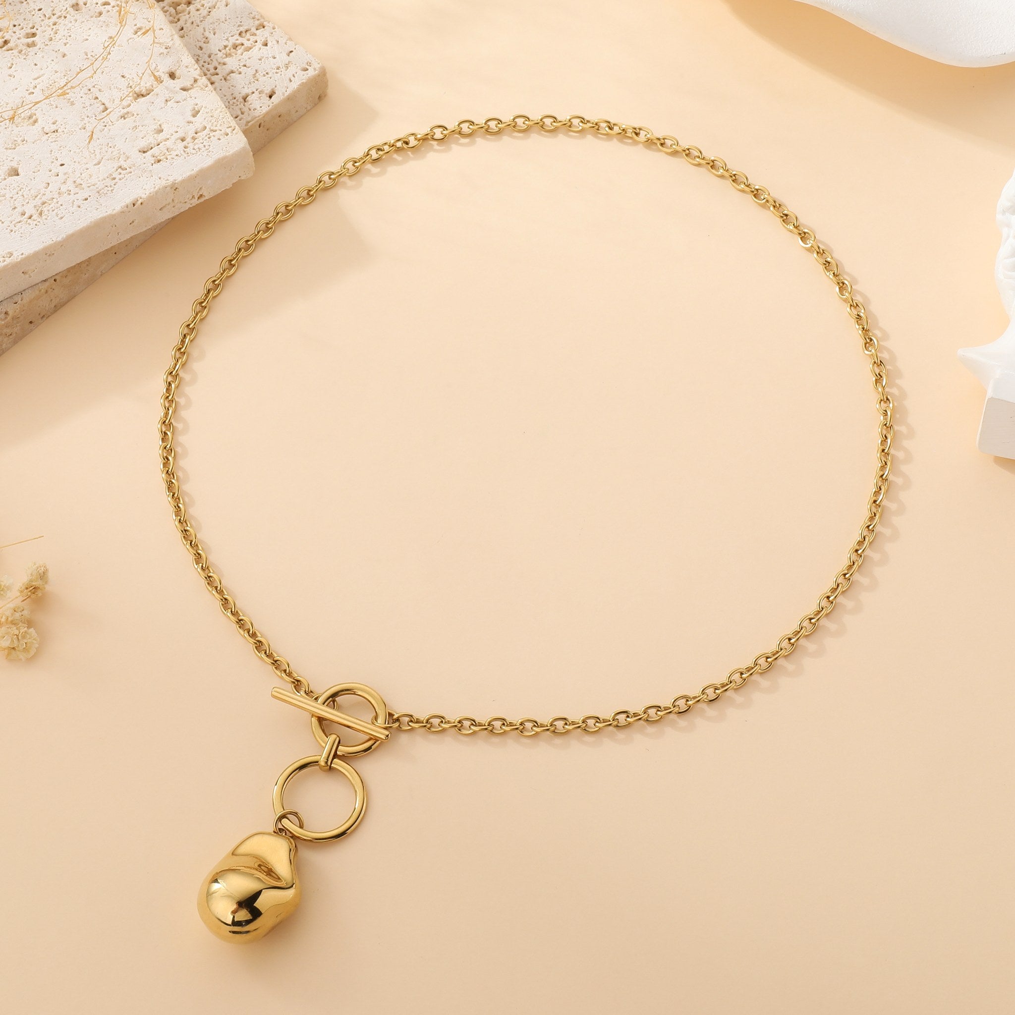 Talismán - Collier fermoir T à pendentif