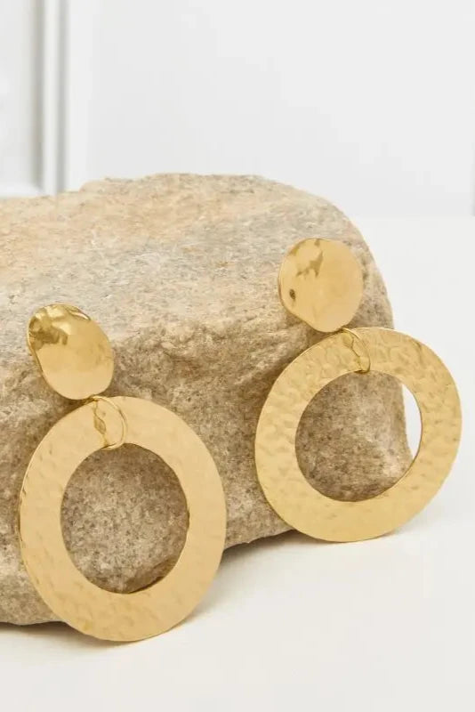 Hammered earrings adorned with orange and parma stones