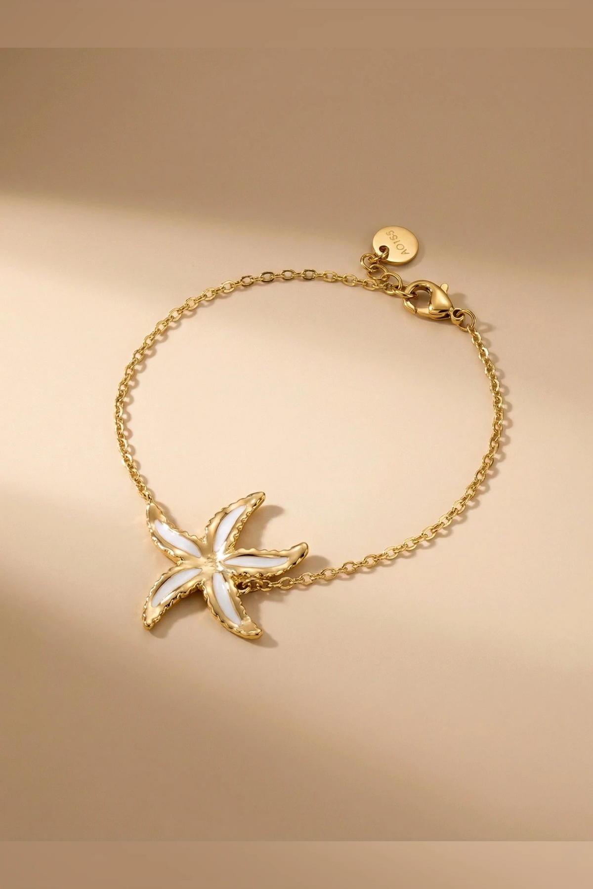 White star - Bracelet étoile de mer blanche et dorée en acier inoxydable